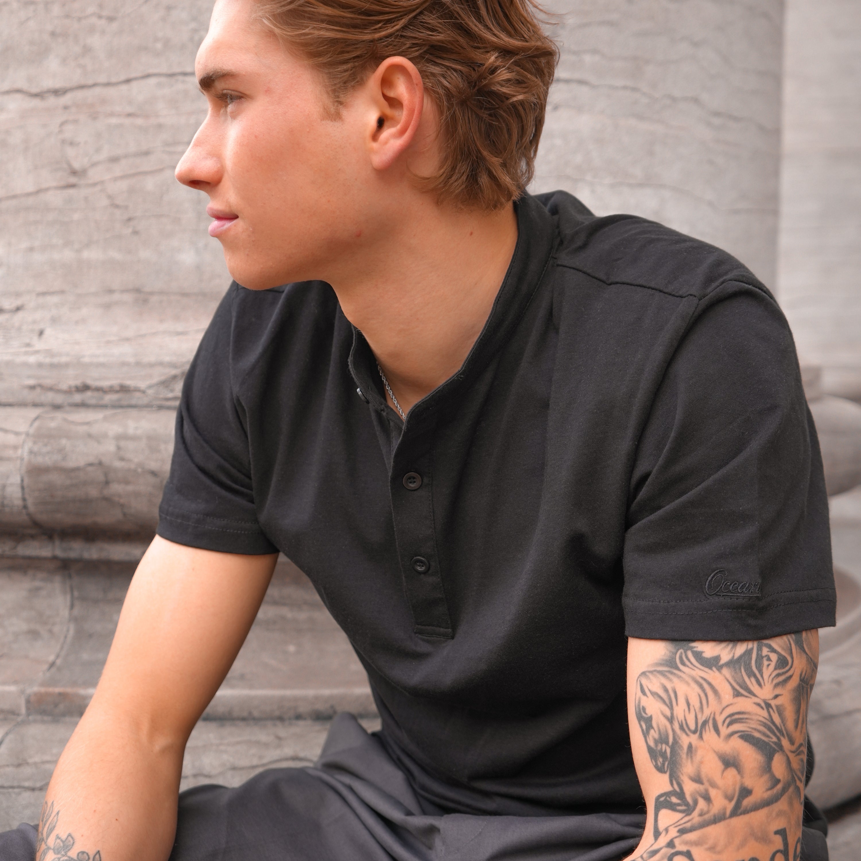 black half-collar tee
